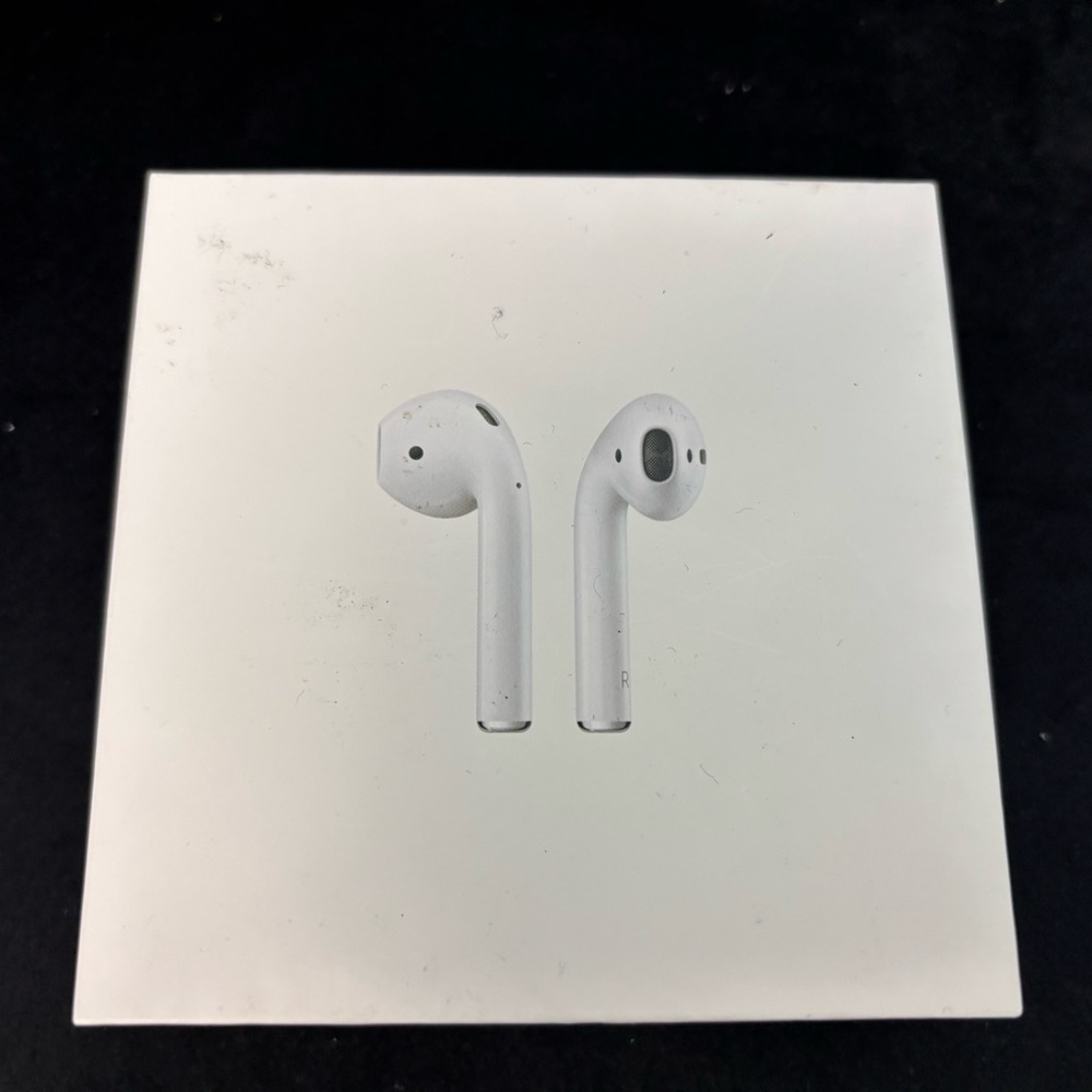 Apple AirPods first generation with Charging Case - White